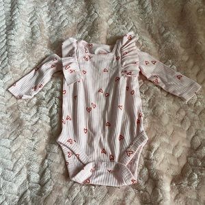 Pink onesie w/ hearts